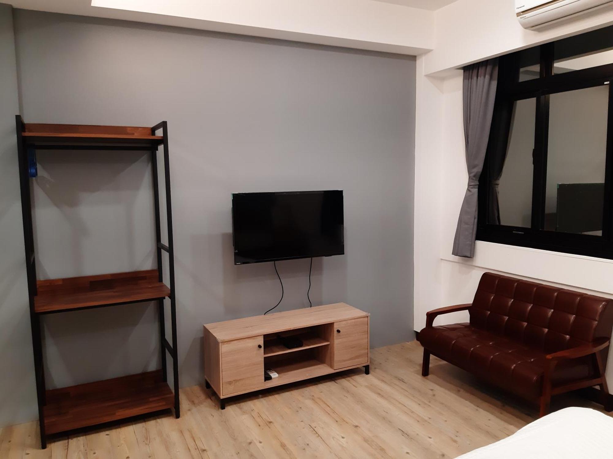 藏青民宿the Wind Guesthouse-Youth Inn Тайнан Стая снимка